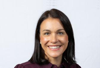 A professional headshot of Jenny Edwards.