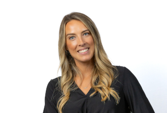 A professional headshot of Suzanne Barker.