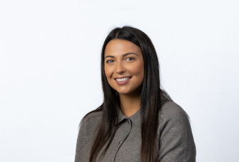 A professional headshot of Emily Smithies.