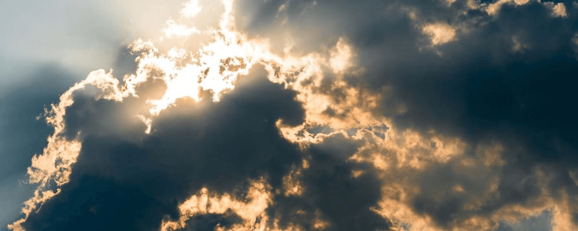 clouds with sun bursting through