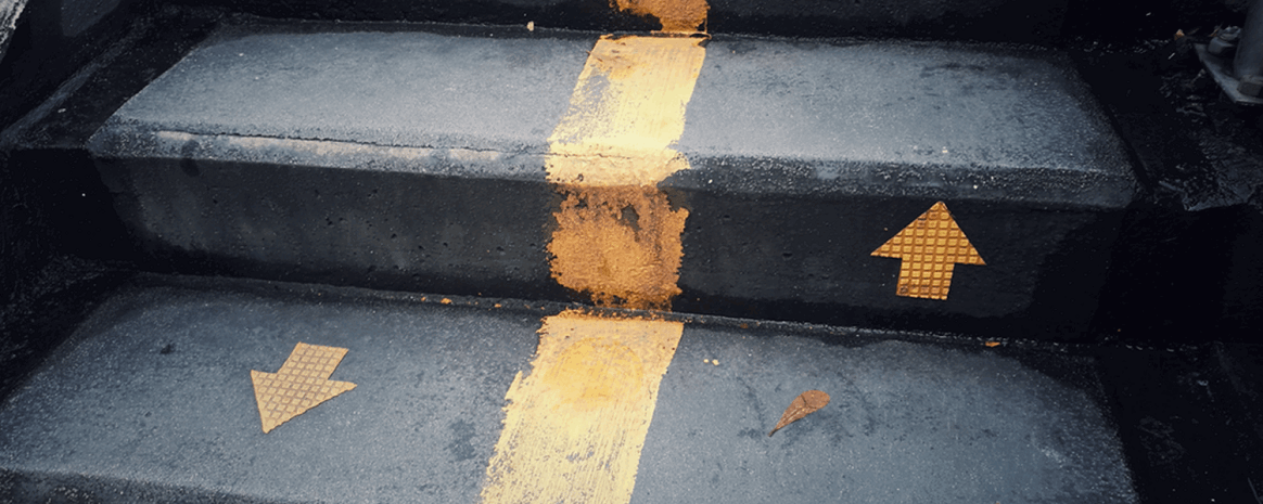 steps with painted arrows