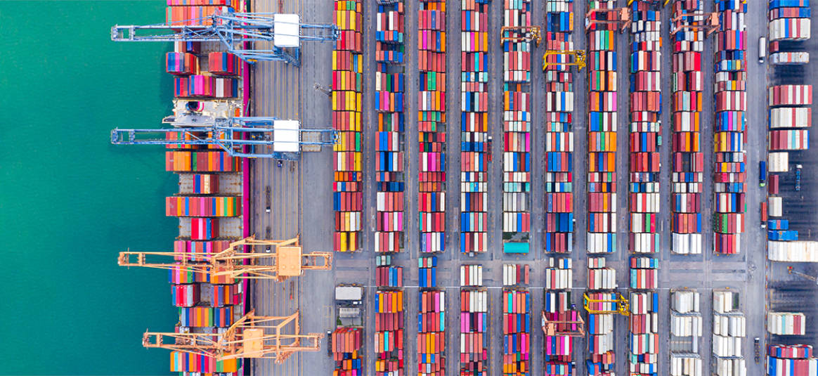 Ariel view of a busy container port facilitating global trade.