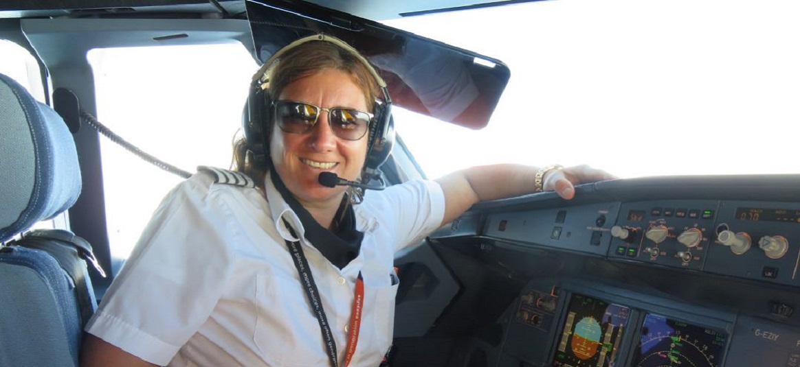 Photo of Captain Emma Henderson MBE in the cockpit
