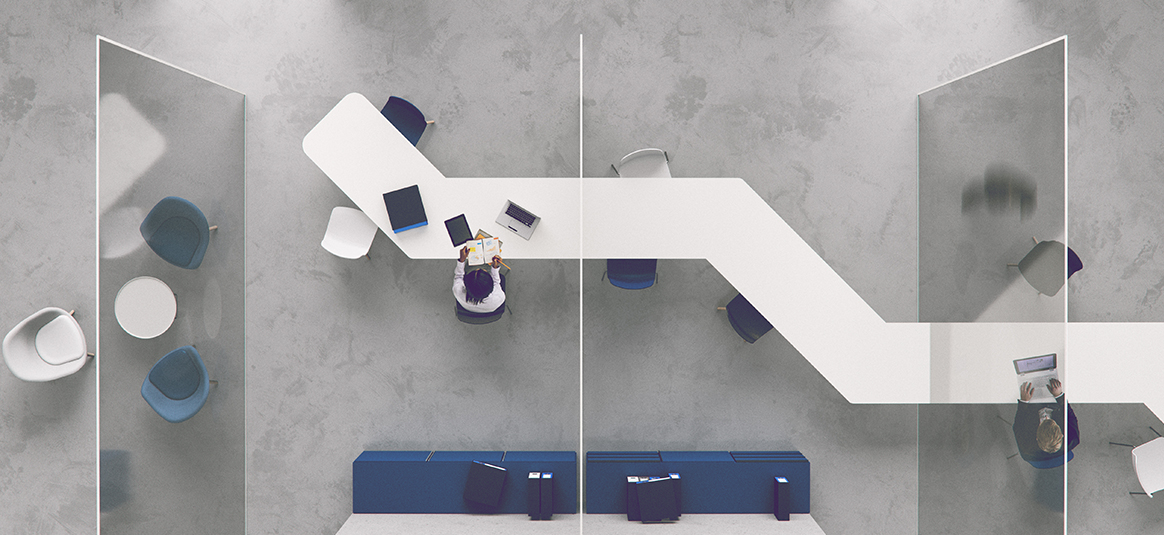 Top-down photo one person sitting at an angular white corporate table
