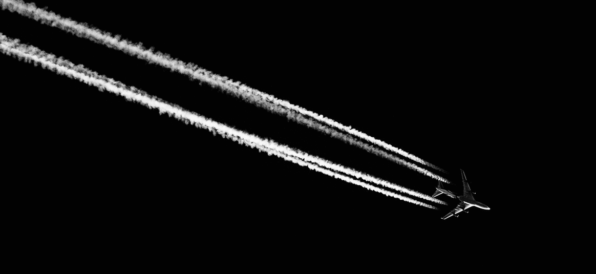 black and white image of aircraft in motion