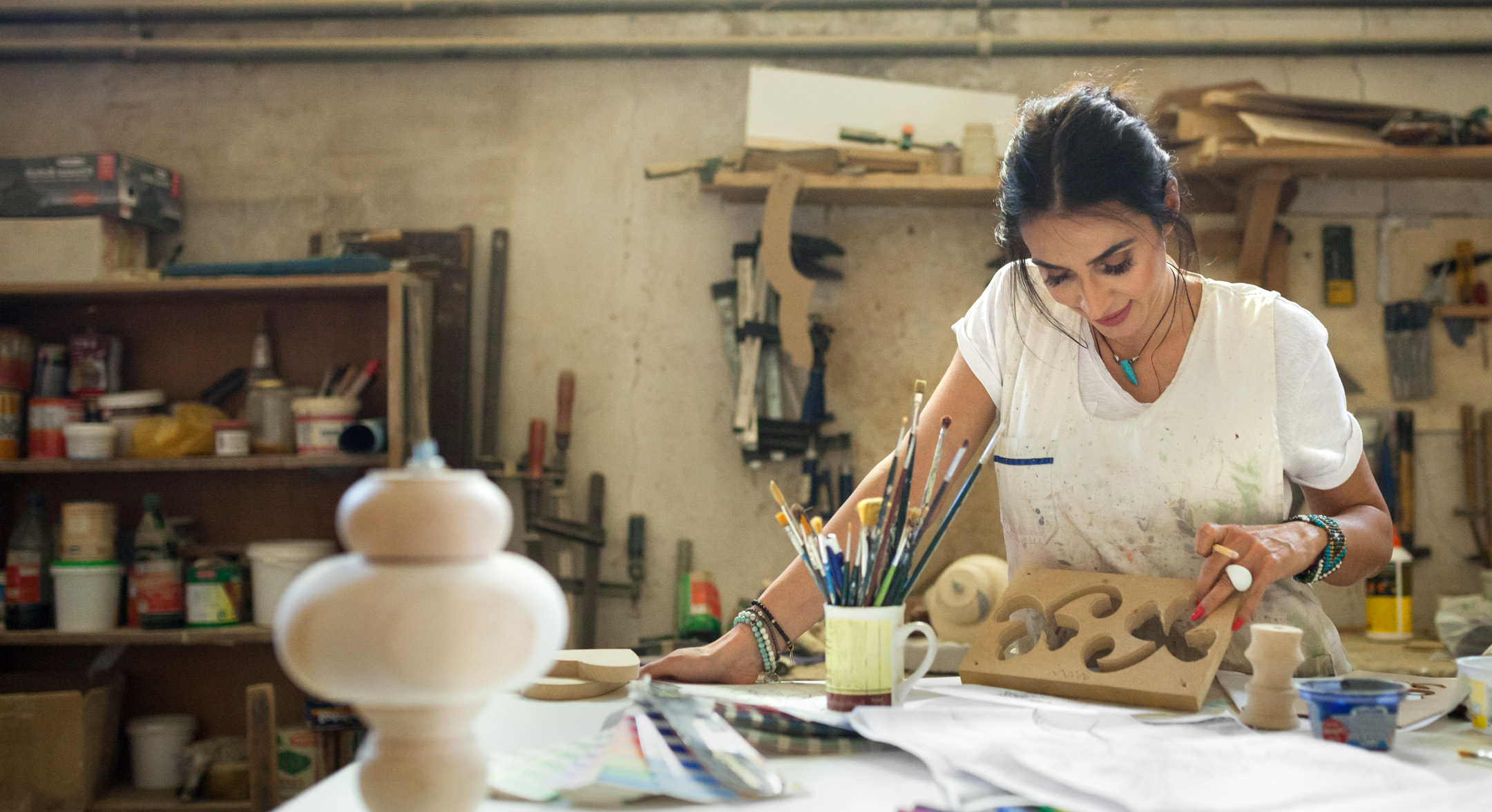 woman working in pottery shop