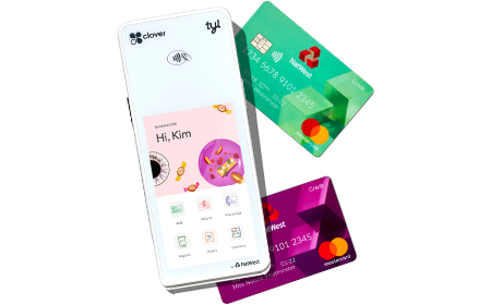 Render of the Tyl app and two NatWest bank cards