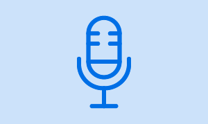 Blue icon of a microphone.