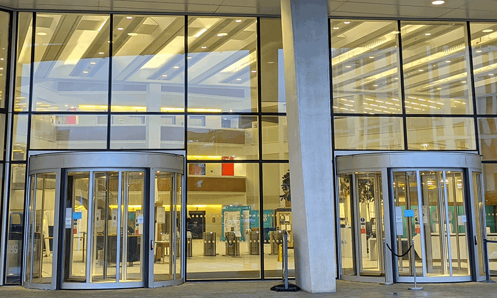 Photo of a glass fronted office building entrance