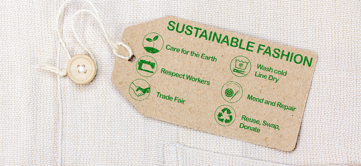a cardboard clothing label, highlighting key elements of sustainable fashion