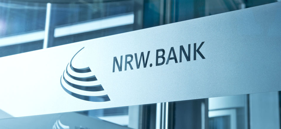 NWR.Bank logo on etched into a frosted stripe on glass.