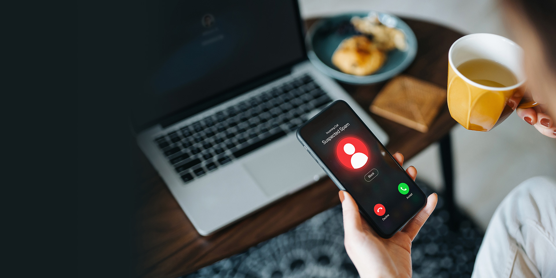 a scam call coming up on a mobile phone screen