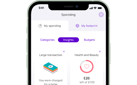 Mobile banking app screenshot showing Spending newsfeed