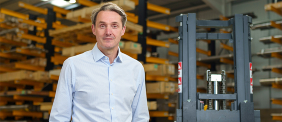 Paul Thwaite, the CEO, standing in as warehouse environment.