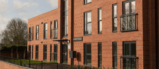 An image of a red brick building with a sign reading 'Beswick House'.