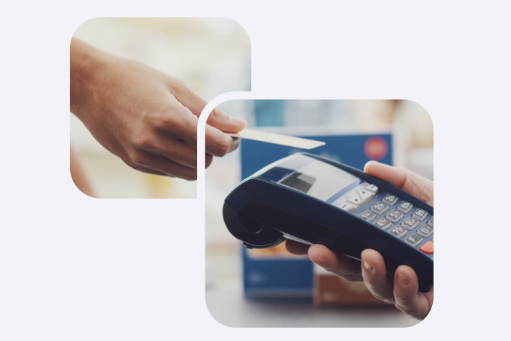 A hand tapping a debit card on a card reader.