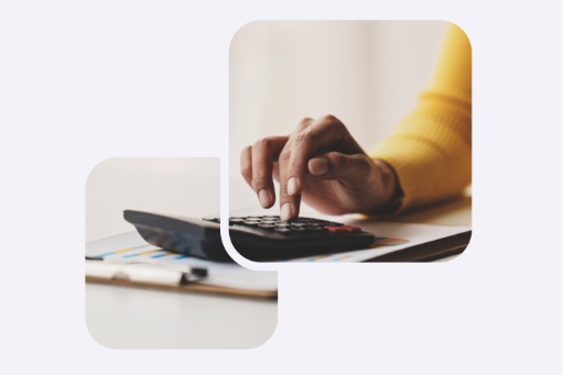 A hand typing on a calculator.