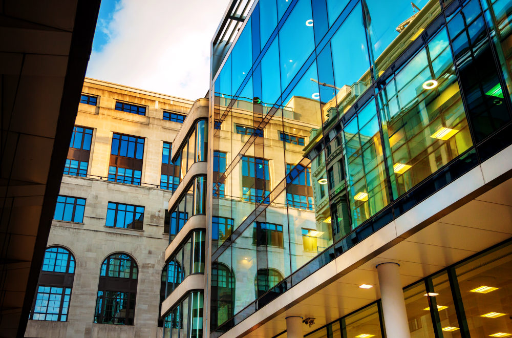 A modern looking office building in a city environment.
