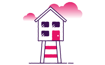 daughter hugging mother whilst smiling with laptop on table