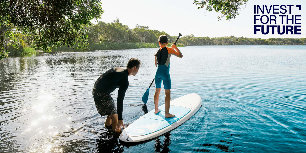 father and son in lake
