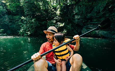 man and child in boat
